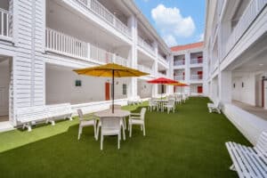 The breezeway between buildings at The Victoria Senior Living complex is a great place to enjoy outdoor time with friends.