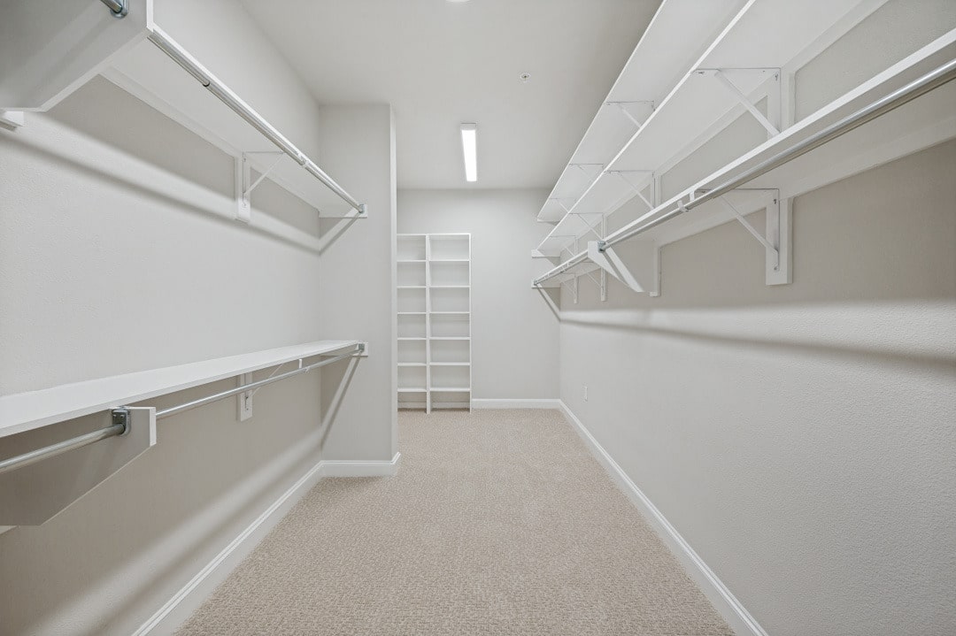 Walk-in closets provide ease of use and maximize storage at the luxury senior living apartments of The Victoria.