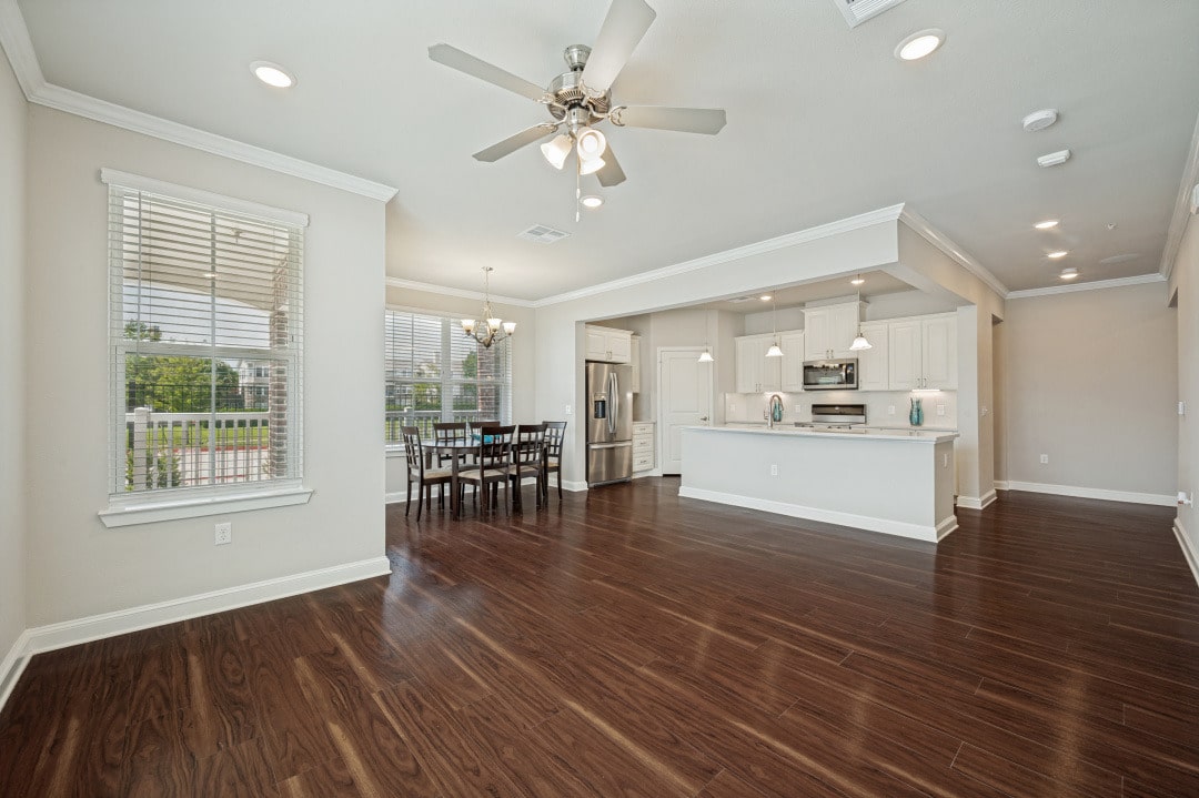 Enjoy a spacious kitchen and dining room at the senior apartment complex of The Victoria in McKinney, TX.